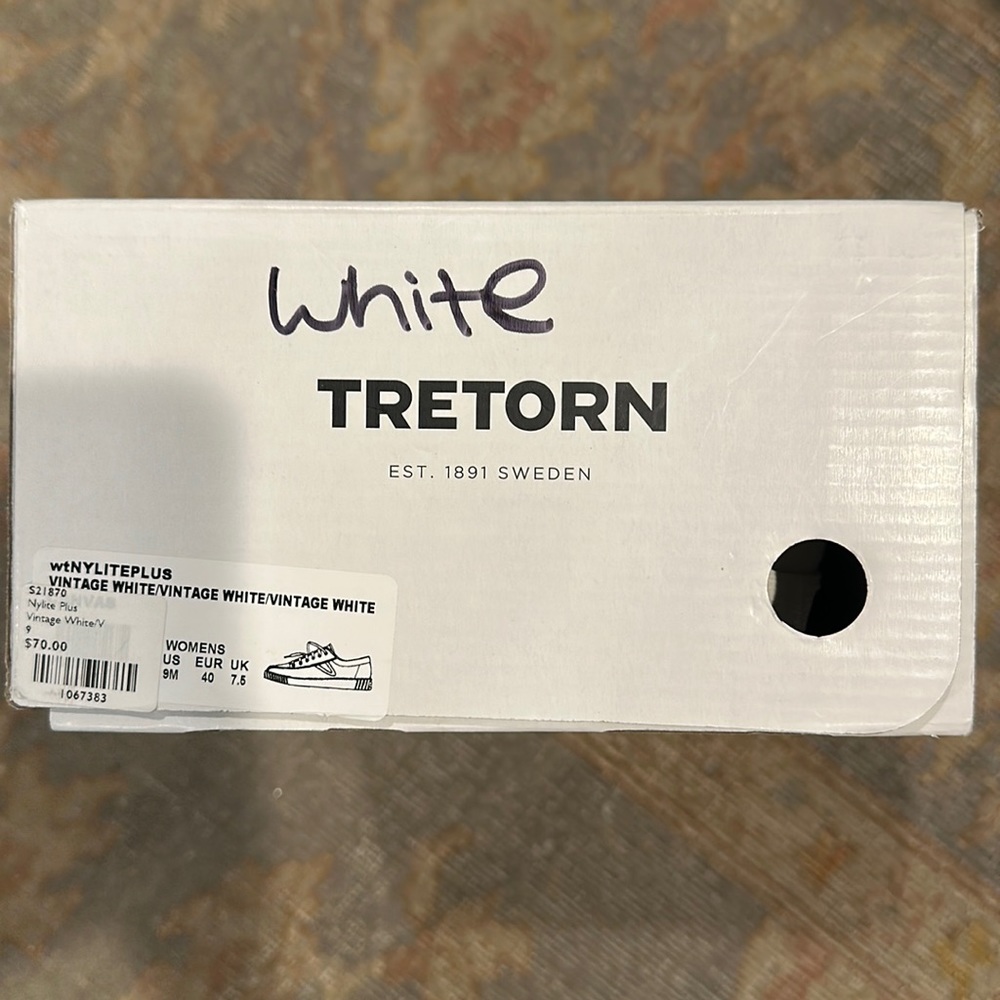 All white Tretorn size 9m. In box. Worn very few times.  Great condition